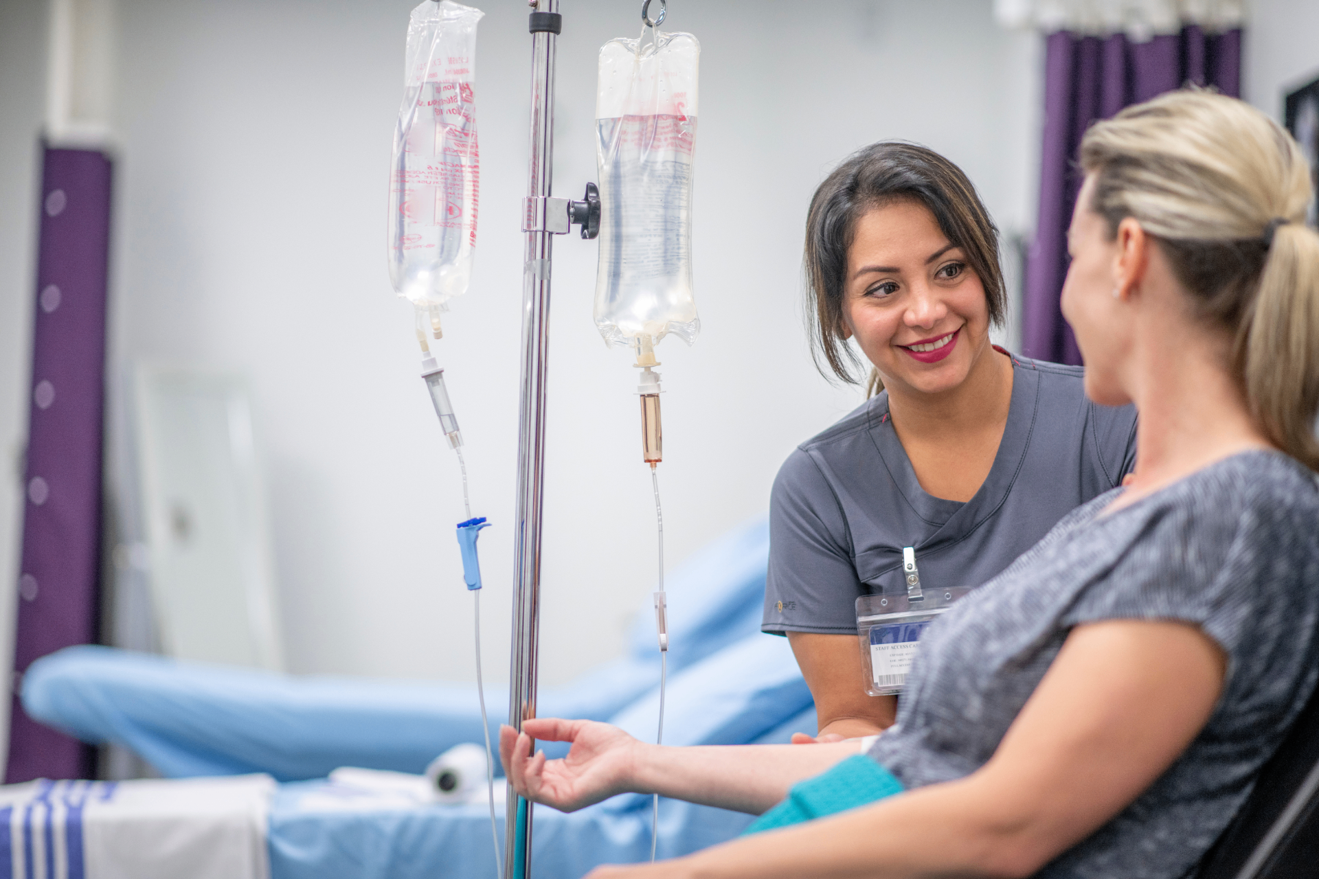 Registered Nurse with a guest during a stem cell IV infusion at iCRYO Port St. Lucie
